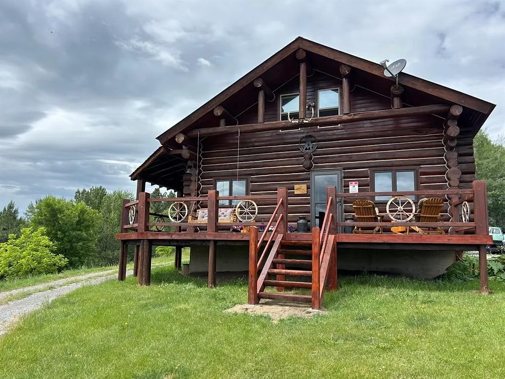 Log home on a knoll with almost 40 acres in three tracts 1 of 16