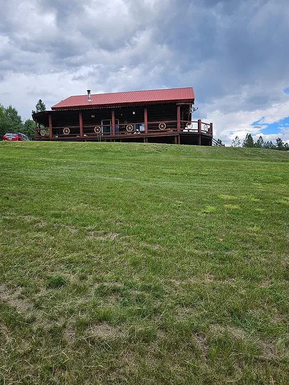 Log home on a knoll with almost 40 acres in three tracts 2 of 16