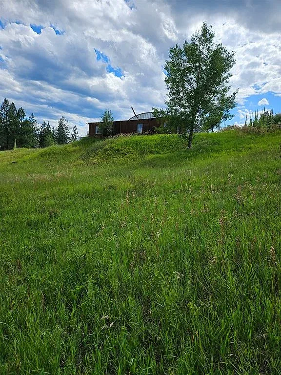 Log home on a knoll with almost 40 acres in three tracts 15 of 16