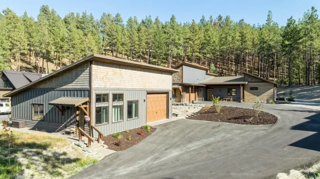 Golf resort home with guest house and heated shop